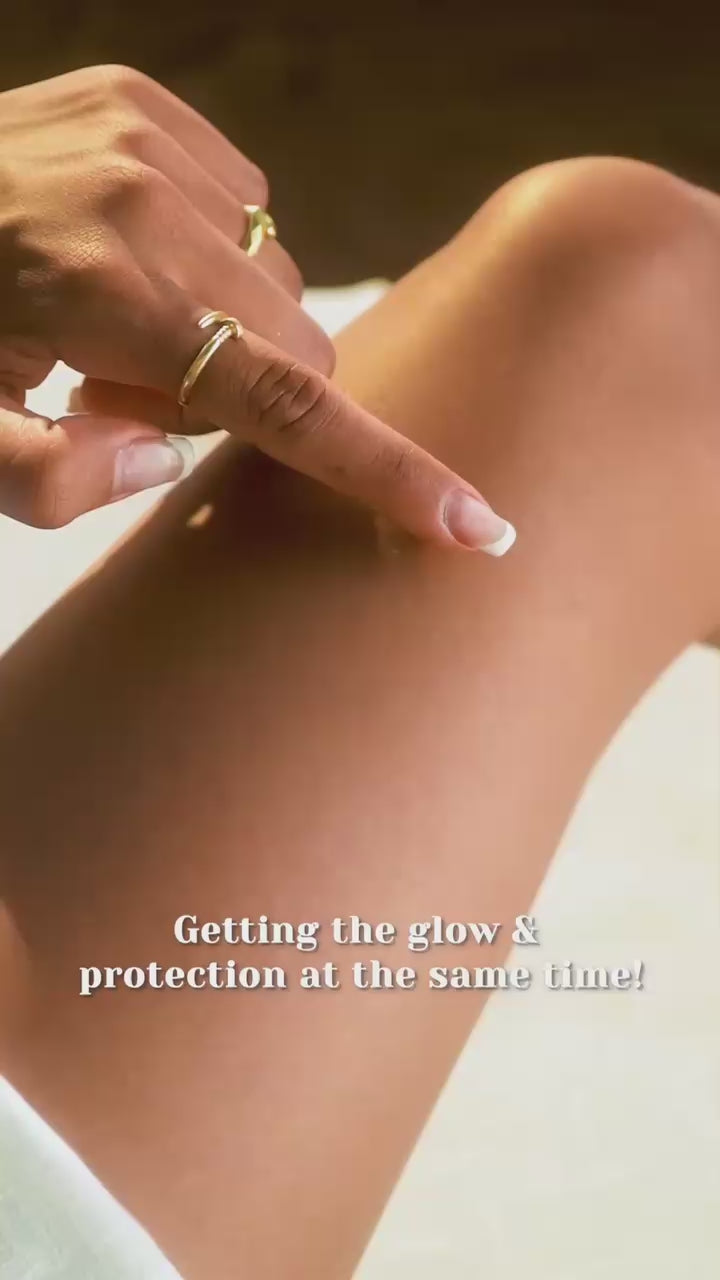 Tropical Glow Shimmering Lotion SPF 15- Sangria